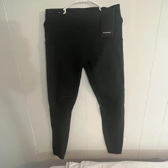 Lululemon Surge Warm Tight Dark Green